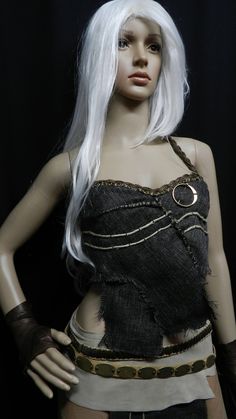 a female mannequin with white hair and black clothing