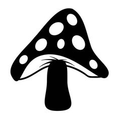 a black and white image of a mushroom with spots on it's cap,