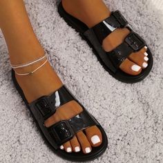 Never Worn Black Flat Flip Flops For Summer, Black Closed Toe Slides For Summer, Black Flat Sandals For The Beach, Black Flat Sandals For Beach, Black Flat Slides For Summer, Black Flat Flip Flops For Vacation, Black Open Toe Slides For Summer, Black Slides For Spring Vacation, Black Flat Sandals For Vacation