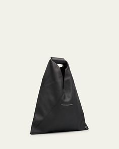 MM6 Maison Margiela hobo bag in grained leather     Integrated top handle    Open top     Lining: Cotton    Approx. 12.6"H x 12.6"W x 0.8"D    Spot clean    Imported Faux Leather Bag, Leather Hobo Bag, Mini Handbags, Mm6 Maison Margiela, Leather Hobo, Small Shoulder Bag, Black Handbags, Japanese Fashion, Hobo Bag