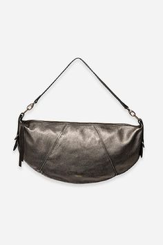 a black leather bag hanging on a wall