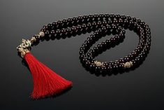 "Islamic gemstone prayer beads is a very personal religious attribute that has to match its owner. We don't just string beads on a thread. We understand the purpose of the rosary beads and we know what materials should be used for it. We created this garnet islamic prayer beads so that you can use it daily for the next few years. It is assembled from one of the most solid stones, on a strong thread with jewelry alloy accessories. A 99 prayer beads with a diameter of 8 mm/0.3 inches comfortably f Traditional Gemstone Beads Rosary For Meditation, Elegant Mala With 108 Beads For Meditation, Elegant Hand-strung Mala For Meditation, Traditional Gemstone Beads Rosary As Gift, Elegant Hand-strung Mala As Gift, Pocket Rosary, Islamic Prayer, The Rosary, Strung Beads