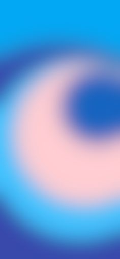 an abstract blurry background with pink and blue circles in the center on a pale blue sky