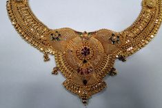 22K Solid Gold (Hallmarked) Choker Necklace & Earrings set from Rajasthan Northern India. Detail handmade piece in very good condition. Net Gold weight -50 Grams Heavy 22k Yellow Gold Jewelry Sets, 22k Gold Bridal Necklace For Anniversary, Gold Kundan Necklace In 22k Gold, Gold Kundan Necklace In 22k For Formal Events, 22k Gold Kundan Necklace For Formal Occasions, Heavy Gold Kundan Necklace For Anniversary, Hallmarked Yellow Gold Kundan Necklace, Hallmarked Yellow Gold Jewelry Sets For Festivals, Heavy 22k Yellow Gold Temple Necklace