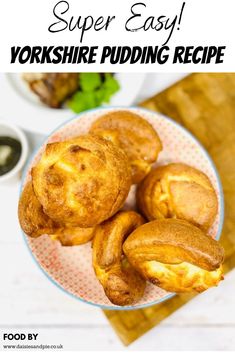 yorkshire pudding recipe on a plate with the title super easy yorkshire pudding recipe