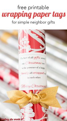 a roll of wrapping paper with a bow on it and text overlay that reads free printable wrapping paper tags for simple neighbor gifts