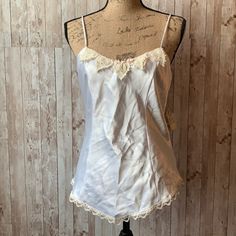 Nwt. Clean. No Flaws. Beaded Laced Neckline. Bridal Wear. 100% Polyester Size L 17” Ptp 14” Pit To Hem White Sleeveless Satin Camisole, White Satin Sleeveless Camisole, White Satin Tank Top For Summer, White Satin Camisole For Spring, White Lace Trim Tank Camisole, White Satin Cami Top, Linen Camisole, Green Cami, Cowl Neck Shirt