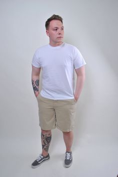 Hi! This is 90's vintage POLO Ralph Lauren chino shorts in beige color with button closure and zip fly type. This shorts made of COTTON.  The best choice for your casual minimalistic outfit in hot summer weather. You can wear it with blue Oxford shirt for some classic look or with graphic tee. Model on the photo is 175 cm tall and is wearing a LARGE size shorts. But, be careful, this is a vintage size, it is better to check the measurements below in the product description.   Width - 42cm / 16.5 Beige Cotton Bermuda Cargo Shorts, Casual Beige Cotton Bermuda Shorts, Casual Beige Bermuda Shorts, Casual Beige Cotton Cargo Shorts, White Cotton Cargo Shorts With Built-in Shorts, Casual Beige Bermuda Cargo Shorts, White Relaxed Fit Cargo Shorts, Beige Cotton Cargo Shorts, Beige Cotton Jean Shorts