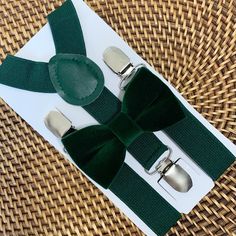 Your special guy will look so handsome when he shows up wearing this elegant velvet emerald dark green bow tie and suspenders with silver clips! This set is a great choice for family photos, wedding, ring bearer outfit, birthday celebration or any other special occasion. ❤ **Please Specify** Bow Tie Only (w/ Clip or Neck Strap), Suspenders Only, or Bow Tie Only & Susp (Bow Tie and Suspenders) SUSPENDERS- One Pair of our Quality Suspenders BOW TIE - One Bow Tie on White Adjustable STRAP or Alliga Dark Green Wedding Accessories, Winter Wedding Ring Bearer Outfit, Winter Ring Bearer Outfit, Green Ring Bearer Outfit, Ring Bearer Outfit Suspenders, Suspenders Ring Bearer, Green Suspenders, Gentlemen Wear, Velvet Bow Tie