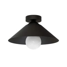 a black and white light hanging from the ceiling