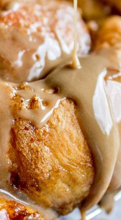 a close up of food on a plate with gravy