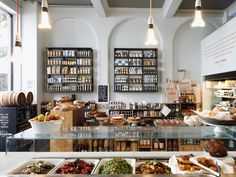 an image of a restaurant setting with food on the counter