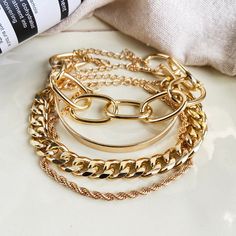 Whether worn alone or layered together, these shimmering bracelets are great for lending a whimsically-golden air to your ensemble. Includes four bracelets Bracelet 1: 2.36" diameter Bracelet 2: 7.48" L Bracelet 3: 6.61" L Bracelet 4: 7.48" L Lobster claw clasp 18k gold-plated copper Cheap Bracelets, Girlfriend Anniversary, Festival Birthday, Beach Festival, Anniversary Jewelry, Bracelet Online, Star Moon, Platinum Metal, European Vintage