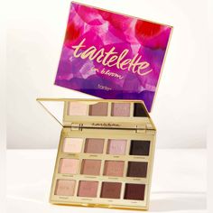 Winner Best Palette, Allure Readers’ Choice Award 2021 What It Is Get Your Shadow Skills Bloomin' With This Cult-Favorite Palette Packed With Everyday Essential Shades! Why We Love It 12 Neutral & Bronze Lid, Crease & Liner Shades Arranged In Coordinating Rows For 3 Easy Looks Shades Make Eyes Look Bigger & More Open Amazonian-Clay Infused To Prevent Smudging Cruelty-Free Includes Micro-Shimmer & Matte Shades: Charmer (Matte Off White) Jetsetter (Matte Warm Taupe) Rocker (Taupe Shimmer) Smokesho Tarte Eyeshadow Palette Bloom, Make Eyes Look Bigger, Clay Palette, Tartelette In Bloom, Eyes Look Bigger, Dark Eyeshadow, Warm Taupe, Color Vibe, Tarte Cosmetics