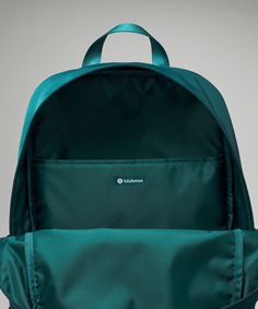 Simplicity at its finest. With an internal laptop sleeve and side water bottle pockets, the Everywhere Backpack is a fresh take on a classic. Designed for On the Move. Dimensions: 29cm x 15cm x 43cm (11.4" x 5.9'" x 16.9"):Volume: 22L. Spacious, front zippered pocket. Side pockets for quick access to water bottle and small items. Interior padded pocket fits a 16" laptop. Functional Outdoor Lululemon Bags, Lululemon Functional Backpack For Everyday Use, Lululemon Nylon Backpack, Lululemon Nylon Standard Backpack, Lululemon Sporty Standard Backpack, Lululemon Backpack For Everyday Use, Lululemon Standard Backpack For Everyday Use, Sporty Lululemon Bags For Outdoor Activities, Functional Green Backpack With Water Bottle Pocket