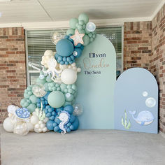 an ocean themed birthday party with balloons and decorations