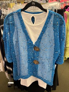 Vibrant Blue with black and white speckle color Mid-length sleeve 2 Over-Size Buttons Perfect cardigan for many dresses or tank tops Size Recommendation: Size down 1 size in this cardigan Sizing Size Dress Size Bust Waist Hips XS 4 34"-35" 26"-27" 37"-38" S 6-8 36"-37" 28"-29" 39"-40" M 8-10 38"-39" 30"-31" 41"-42" L 12-14 40"-41" 32"-33" 43"-44" XL 16 42"-43" 34"-35" 45"-46" 1X 18 44"-45" 36"-37" 47"-48" Lulu-B Clothing was started from a small family business that was founded in 1977 in South Perfect Cardigan, Blue Cardigan, Small Family, Vibrant Blue, Family Business, Bright Blue, Mid Length, Length Sleeve, Mesh