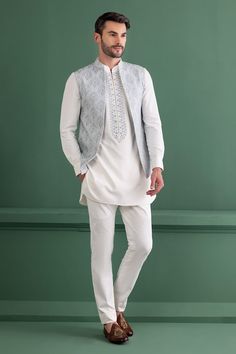 Blue silk bundi with floral butti embroidery. Paired with an inner kurta with embroidered placket and matching aligadhi pant. - Aza Fashions Butti Embroidery, Jayanti Reddy, Kurta Set For Men, Diana Penty, Rohit Bal, Tarun Tahiliani, Nehru Jackets, Embroidery Floral, Silk Embroidery