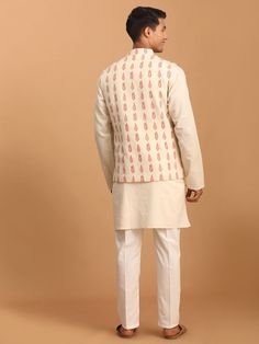 SHVAAS By VASTRAMAY Men's Cream Leaf Printed Pure Cotton Nehru Jacket With Short Kurta And Pant Set Experience elegance and comfort with the SHVAAS Nehru Jacket, Short Kurta, and Pant set. Crafted from pure cotton, it's a blend of tradition and contemporary fashion. Features: Cream Leaf Printed Design Nehru Jacket, Short Kurta, and Pant Set Made from Pure Cotton for Comfort Unique Blend of Tradition and Modernity Specifications: Color: Cream Material: Pure Cotton Design: Leaf Printed Set Include White Cotton Nehru Jacket, Traditional Fitted Nehru Jacket With Pockets, Cotton Nehru Jacket With Stand Collar For Winter, Beige Nehru Jacket For Semi-formal Occasions, Festive Cotton Stand Collar Outerwear, Winter Cotton Nehru Jacket With Stand Collar, Festive Cotton Outerwear With Stand Collar, Cotton Nehru Jacket With Long Sleeves And Pockets, Cotton Nehru Jacket With Pockets And Long Sleeves