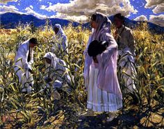 two women and one man are standing in the middle of a cornfield with clouds above them