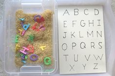 a plastic container filled with letters and numbers