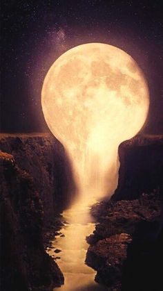 the full moon is shining brightly in the night sky over a river running through a canyon