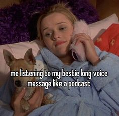 a woman laying in bed holding a dog and talking on the phone with someone else