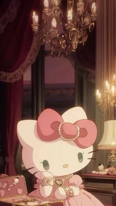 a hello kitty sitting on top of a table next to a lamp and chandelier