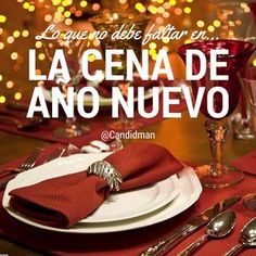 an image of a table setting with red napkins and silverware on it in spanish