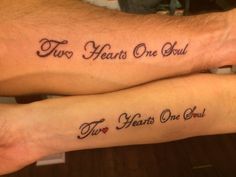 two people with tattoos on their arms that say, two hearts one soul and two years one soul