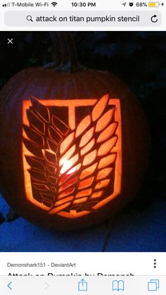 a pumpkin carved to look like the symbol for attack on titan's stencil