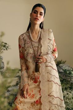 Product Description: Embroidered Printed Chiffon Front Embroidered Organza Front & Back Daman Border Embroidered Organza Neck Patch Printed Chiffon Sleeves Embroidered Organza Sleeve Patch Printed Chiffon Back Embroidered Organza Dupatta Embroidered Organza 4 Sides Dupatta Borders Plain Dyed Raw Silk Trouser Plain Dyed Inner Lace Salwar Kameez With Intricate Embroidery For Eid, Eid Lace Salwar Kameez With Intricate Embroidery, Anarkali Sets With Floral Embroidery In Lace, Eid Salwar Kameez With Intricate Lace Embroidery, Unstitched Lace Salwar Kameez With Intricate Embroidery, Festive Lace Sets With Floral Embroidery, Semi-stitched Embroidered Lace Salwar Kameez, Bollywood Beige Sets With Floral Embroidery, Bollywood Style Beige Sets With Floral Embroidery