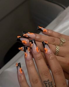 #nailsofinstagram #nailsoftheday #naildesign #nails #selfcare #womenswear #nailtech Black Tip Nails With Flowers, Acrylic Nail Designs September, Simple Baddie Nails Almond, Nail Ideas Orange And Black, French Tip With Acrylic Flowers, Orange Nail Designs Fall Autumn, Fall Nail Short Square, Black N Orange Nails, Halloween Color Nails Acrylic