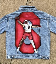 Hand-painted, custom jean jackets available. I have painted hundreds of custom jean jackets and would love to create a custom piece for you. Please see the photos (or my Instagram @creationsbynataliee) for some of my work. NOTE that your jacket does not have to be a professional athlete, I can make a jacket for anyone, I just require a clear reference photo to work from. Jackets provided by me: Once you purchase this option, I will message you to get color, fit, size, and wash. I will then order a jacket that fits your vision. (I do not take specific brand requests for jackets)  You provide the jacket: Some people prefer to provide the jacket themselves. Once you purchase, I will send you my business address and you will be responsible for sending me a jacket. If you have questions, please Painted Football Jean Jacket, Sports Jean Jacket, Jean Jacket Football Girlfriend, Football Denim Jacket, Spray Paint Jacket, Jean Jacket Custom, Custom Painted Jacket, Football Jean Jacket Girlfriend, Custom Jacket Paint