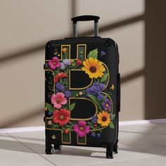 This Bitcoin Floral Botanical Logo Suitcase is perfect for the modern traveler who wants to stand out. With vibrant colors and a unique design, this hard case suitcase is not only durable but also stylish. Whether you're going on a vacation or a business trip, this suitcase will make a statement and keep your belongings safe. Ideal for Bitcoin enthusiasts looking to show off their love for cryptocurrency while traveling. Product features - Inner pockets for smaller items - Customizable 100% polycarbonate front and black ABS back for durability - Vibrant colors with the latest printing techniques - Extended storage option for larger capacity - Built-in lock for enhanced security Care instructions - Before cleaning the bag, remove all the items from the bag. Suggested to pretreat visible sta Rectangular Travel Case, Multicolor Portable Travel Cases, Multicolor Rectangular Cases With Luggage Sleeve, Multicolor Rectangular Cases For Trip, Multicolor Rectangular Cases For Trips, Multicolor Bags With Luggage Sleeve For Gift, Botanical Logo, Capacity Building, Vacation Accessories