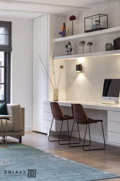 a living room filled with furniture next to a window