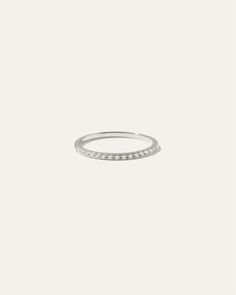 a white gold ring with diamonds on it