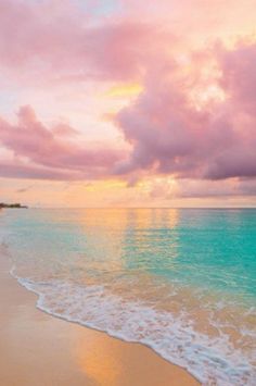 the beach is clean and ready to be used as a backdrop for this beautiful sunset