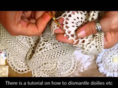 there is a woman that is working on some doily with crocheted material