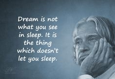 a man with his hand on his face and the words dream is not what you see in sleep it is the thing which doesn't let you sleep