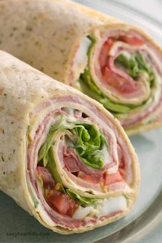 two pictures of a wrap with meat and lettuce in it on a plate