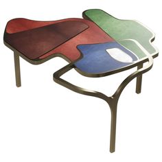 a table with three different colored shapes on it