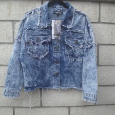 Y2k 80s 90s Acid Wahs Distressed Destroyed On Purpose Look Denim Jacket By Thrill Jeans Med #0369 Size: Med 21" Pit To Pit 21" Neckline To Hem 15" Sleeve Length--Dropped Sleeves Fabric: 100% Cotton Two Front Pockets (5) Metal Buttons Down The Front Item#0369-Blue Bins Jean Jacket Denim Jacket Acid Wash 80s Jacket Streetwear Heading To A Y2k Party, 80s 90s Or Halloween Party---This Is Right On Trend For The Party 100% Cotton New With Tags Grunge 90's Denim Distressed Denim Jackey Check Out My Clo Acid Wash Distressed Denim Jacket For Streetwear, Distressed Denim Blue Jacket In Grunge Style, Distressed Denim Blue Grunge Jacket, Ripped Denim Jacket For Streetwear In Grunge Style, Ripped Grunge Denim Jacket, Vintage Ripped Long Sleeve Outerwear, Ripped Medium Wash Outerwear For Streetwear, Vintage Ripped Denim Jacket For Fall, Ripped Cotton Grunge Denim Jacket