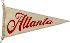 a pennant sign with the word atlanta on it's side and red lettering that reads atlanta