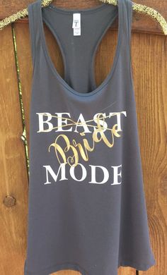 a tank top with the words beast dance mode on it hanging from a hanger