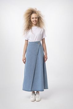 ◆ EXPRESS shipping worldwide - wear your beautiful piece within a few days! ◆ Perfect denim skirt for anytime of the year, any occasion. ◆ Light Blue ◆ Soft touch denim ◆ Wrap Front ◆ A line ◆ Bell shape SIZING The item comes in US Women's sizes 4-6-8-10-12. Our model is 5' 9'' (175 cm) and is wearing size 4. The skirt length to the hem is 3' 1'' (95 cm). FABRICS & CARE * Fabric: 100% cotton * Care: Turn inside out before washing. Use warm hand wash or cold machine wash. Do not bleach, soak, Maxi Denim Skirt Outfit, Modest Denim Skirts, Denim Long Skirt, Flared Denim Skirt, Denim Wrap Skirt, Outfit Modest, Tall Skirt, Long Skirt Casual, Cotton Maxi Skirts