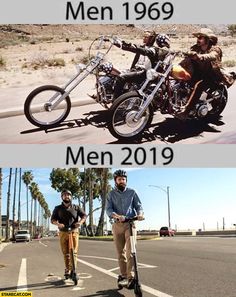 two men are riding motorcycles on the same street and one is standing next to each other