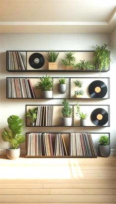 there is a record player on the wall next to some plants and records in front of it