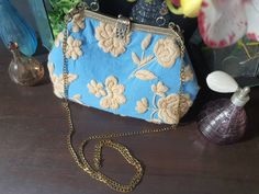 Hi! Welcome to my boutique KWCollectionsCraft. Have any questions? Please don't hesitate to ask! I am happy to help!  ⚜ Hand Embroidered Wedding Bag Stand out with this one of a kind hand made embordered arts & crafts handbag. In soft pastel tones with large embroidered flowers this bag is a sweet classic perfect for the upcoming spring and summer wedding season.   A fabulous gift for yourself, a friend or a bridesmaid gift! This elegant bag is bright, delicate and comfortable for all day wear.  ☛ Product Name: Hand Embroidered Wedding Bag ☛ Handmade item ☛ Bag size: L: 11in x H: 10.5in (with handle) x W: 2.5in ☛ Materials: Linen and Cotton ⚜WHY CHOOSE KWCOLLECTIONSCRAFT Our items are all genuine hand made by skilled artisans, no factory production or mill manufacturing. We provide the bes Rectangular Shoulder Bag With Dust Bag For Wedding, Vintage Blue Bags For Wedding, Vintage Blue Bag For Wedding, Handmade Shoulder Bags For Weddings, Blue Embroidered Wedding Bag, Blue Handmade Bag For Wedding, Blue Handmade Bags For Wedding, Handmade Blue Bag For Wedding, Formal Embroidered Tote Bag