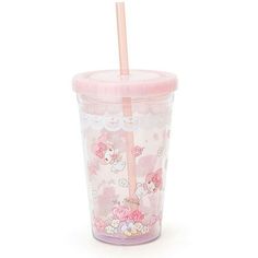 a pink hello kitty cup with a straw in it